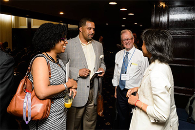 Summit attendees getting to know each other